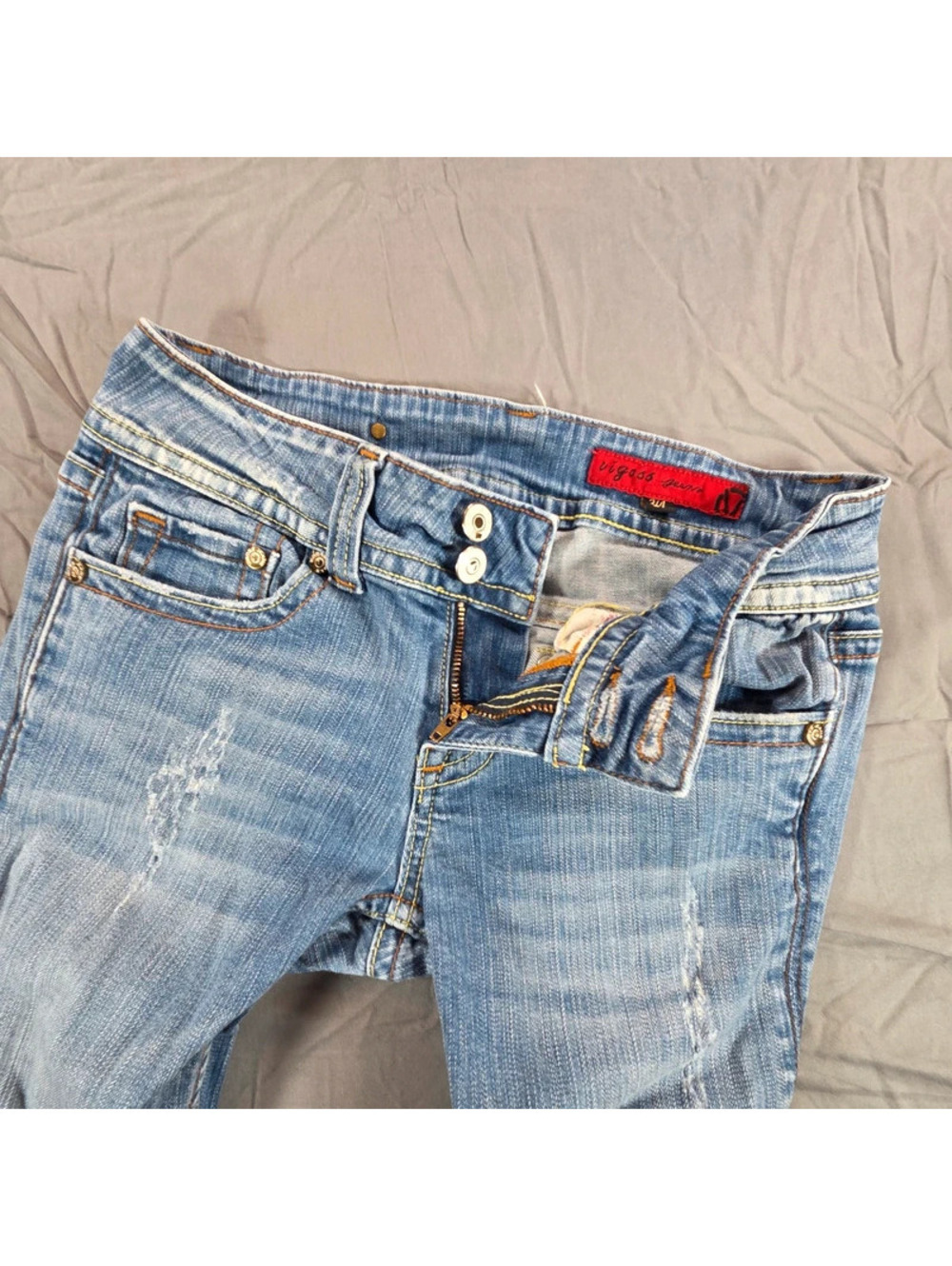 Vigoss low-rise distressed blue denim